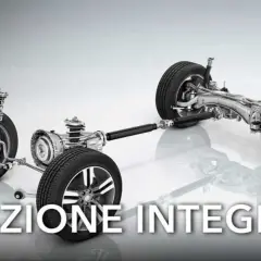 Sistema di trazione integrale 4x4 con sospensioni e alberi di trasmissione visibili.