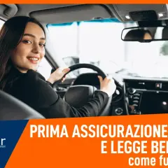 Giovane donna al volante, scopri la prima assicurazione auto per neopatentati con la legge Bersani.
