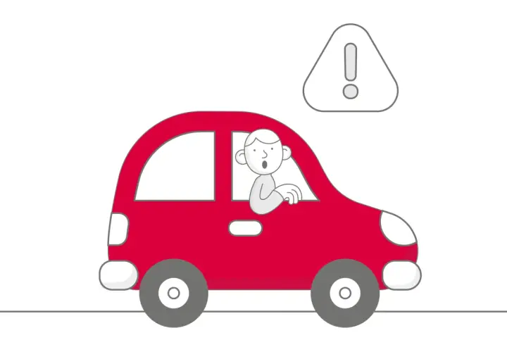 Uomo sorpreso alla guida di un'auto rossa con un punto esclamativo. Se l'assicurazione non paga devo pagare io.