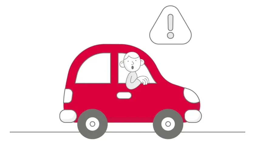 Uomo sorpreso alla guida di un'auto rossa con un punto esclamativo. Se l'assicurazione non paga devo pagare io.