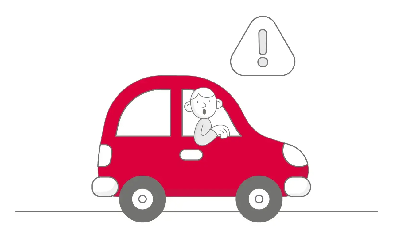 Uomo sorpreso alla guida di un'auto rossa con un punto esclamativo. Se l'assicurazione non paga devo pagare io.